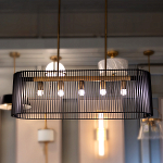 Люстра подвесная овальной формы с металлическим решетчатым абажуром матово-черного цвета и 5 лампами Kichler варинант исполнения - 7 | Loft Concept в Орле